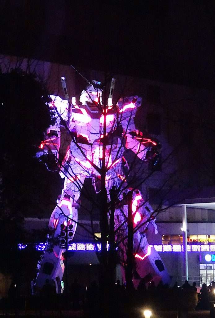 The Gundam statue in full splendour at night
